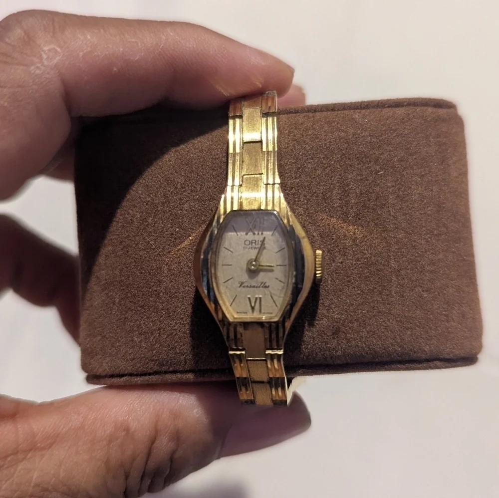 Oris Gold Timepiece with Ivory Dial